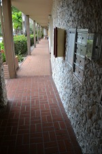 The walkway where the first Taser shots were fired. Small bloodstains remained in the tile grouting.