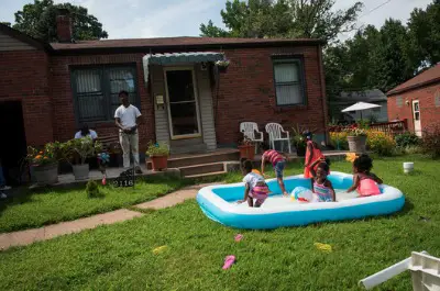 Children at a block party in Jennings, a suburb in north St. Louis County, has shifted since the 1960s from almost entirely white to 90 percent black. Photo: Edwin Torres/ProPublica